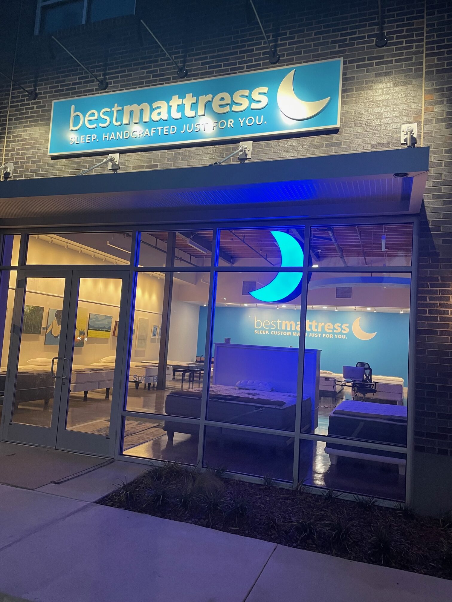 customers hand touching a mattress from best mattress